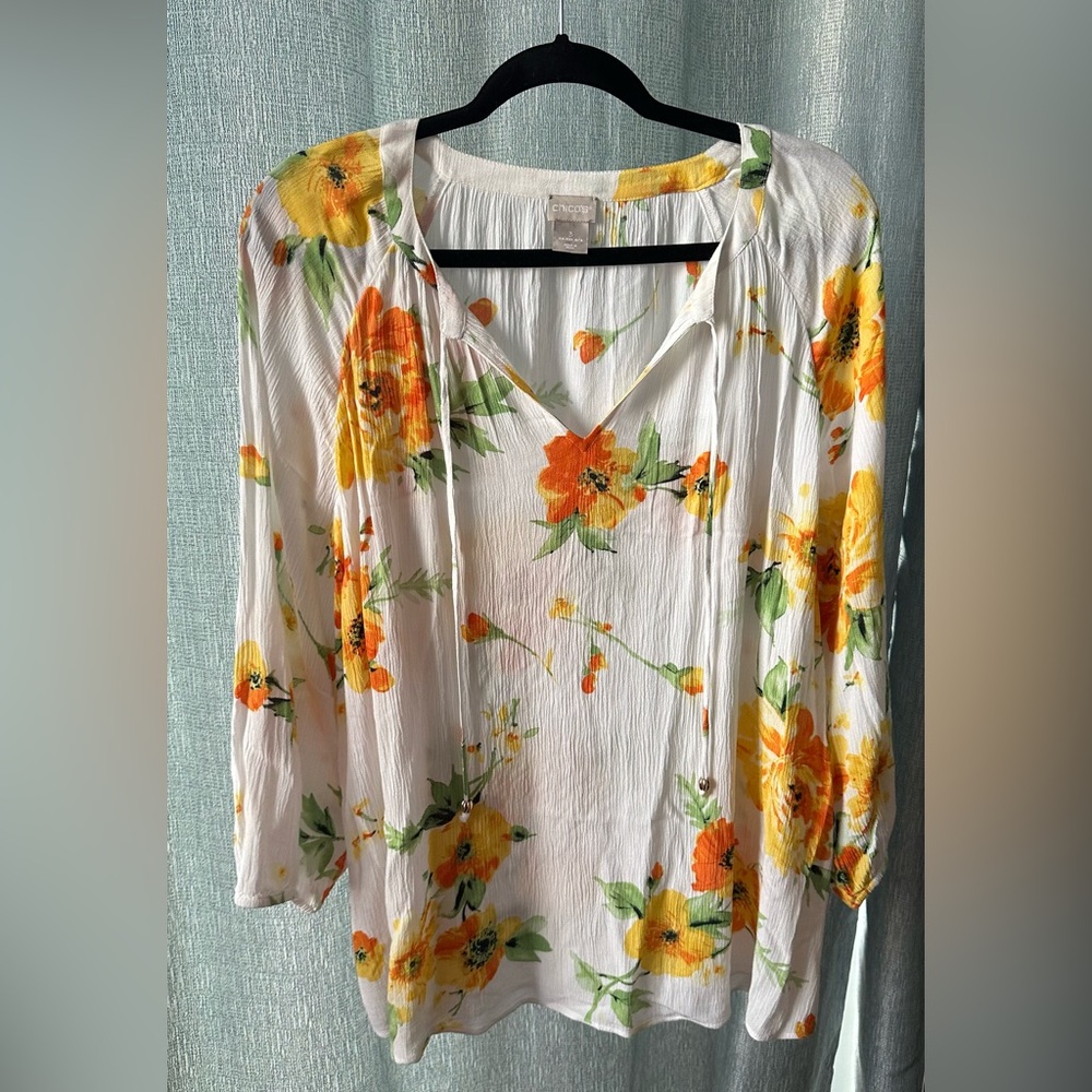 Chico’s tassel tie boho floral blouse size 3. Equal to XL.